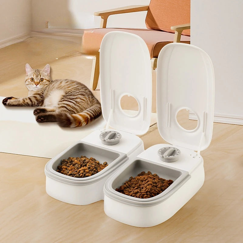 "Mealtime Madness: Electric Double Dish Bowl for Hungry Cats and Dogs!"