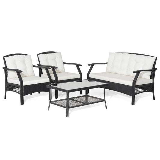 "Outdoor Oasis: 4-Piece Rattan Patio Set with Coffee Table and Cushions"