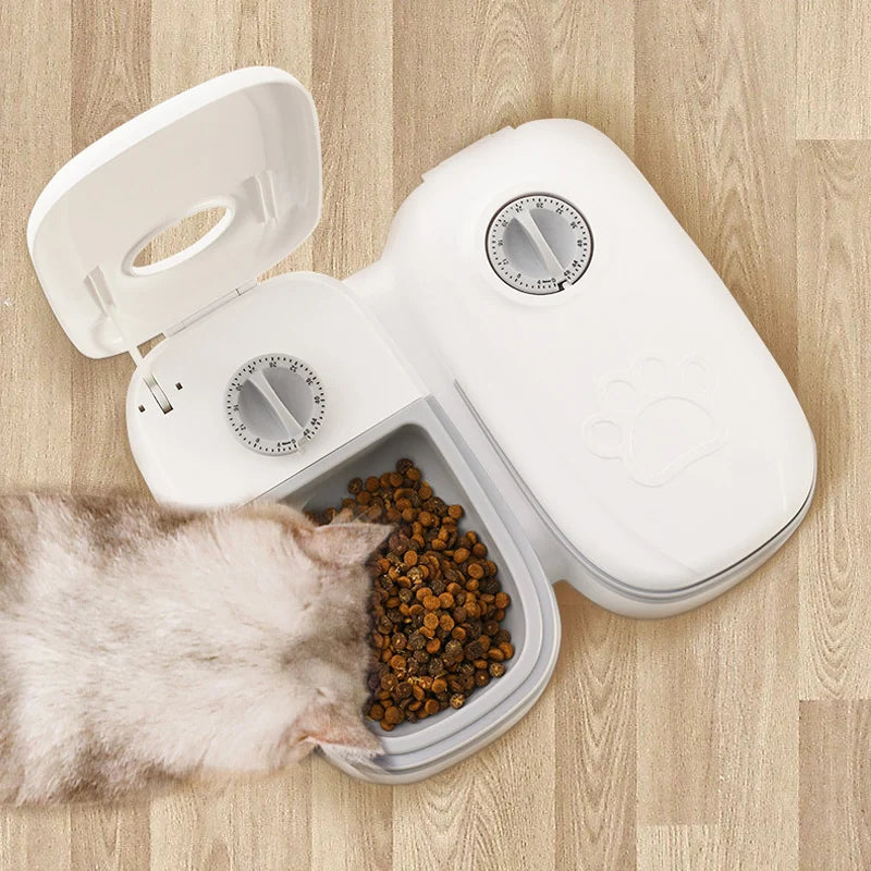 "Mealtime Madness: Electric Double Dish Bowl for Hungry Cats and Dogs!"